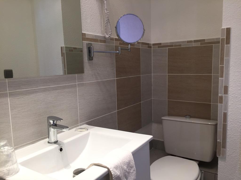Hotel Le Faisan Монлюсон Номер фото